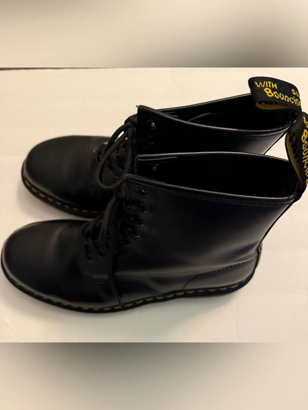 Dr. Martens womens 11/ men’s  10 unisex Black Leather 8-Eye Lace-Up boot.